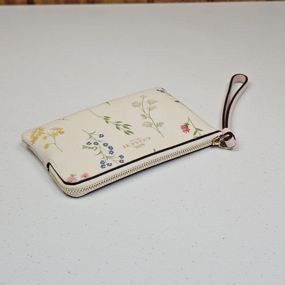 EUC Coach Cream Floral Wristlet